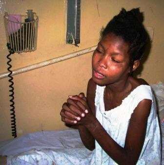 Patient praying at the hospital in Pignon.