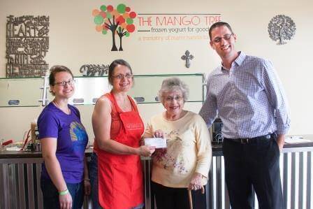 Donation to the Ecumenical Cupboard. Pictured left to right: Liz Clarke, Abbas, Shirley Frey , and Tim Brand