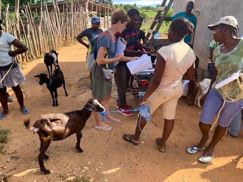 Christi-with-paperwork-Oct-Goat-Distribution-2020