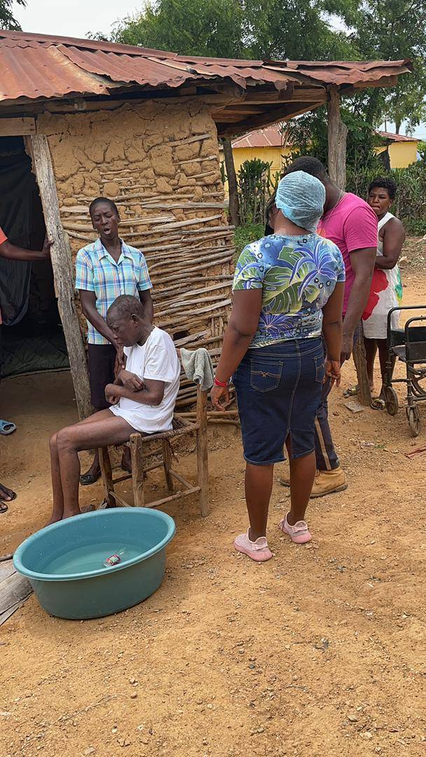 Haiti_StretchOutYourHand_JBL_BathWashing_Nurse_Prayer_June_2023